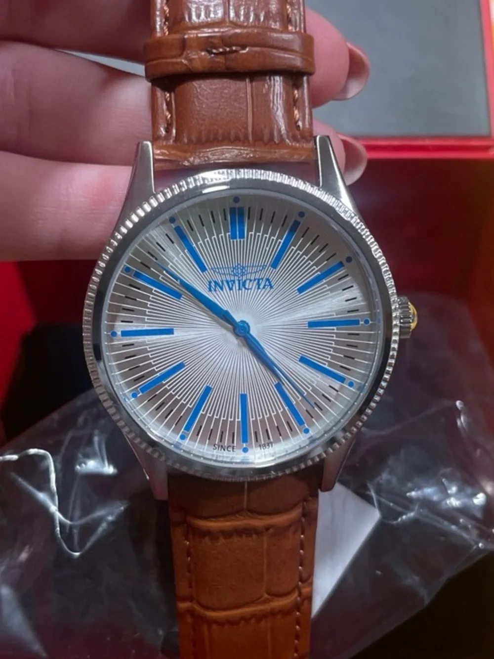 Invicta Silver Dial Watch with Blue Accents and Brown Leather Strap
